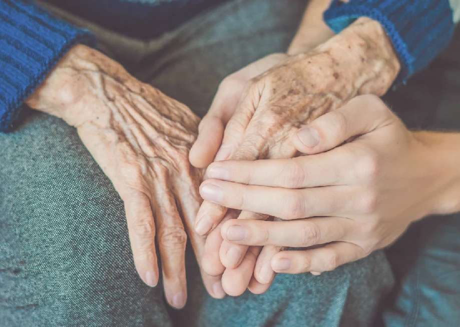 Senior woman smiling at home with caregiver in North Vancouver